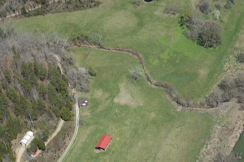 kentucky river lower bottoms looking at creek flowing from mountain on right